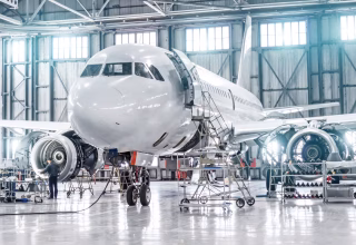 passenger-aircraft-on-maintenance-of-engine-and-fuselage-repair-in-airport-hangar-aaapp-shutterstock passenger-aircraft-on-maintenance-of-engine-and-fuselage-repair-in-airport-hangar-aaapp-shutterstock